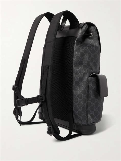 gucci monogram pochette black|gucci black monogram backpack.